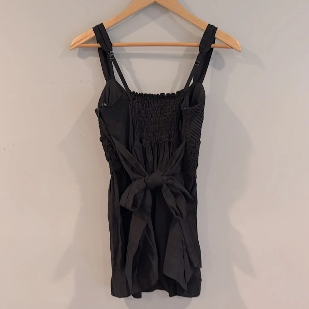 XOXO | Black Sleeveless Top w/ Lace, Bow & Wood Flower Button Detail - Picture 5 of 12